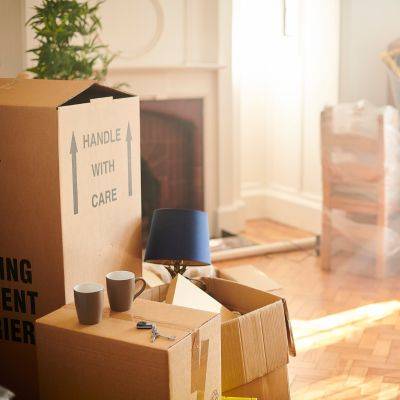 Image shows packed moving boxes in Charlottesville VA